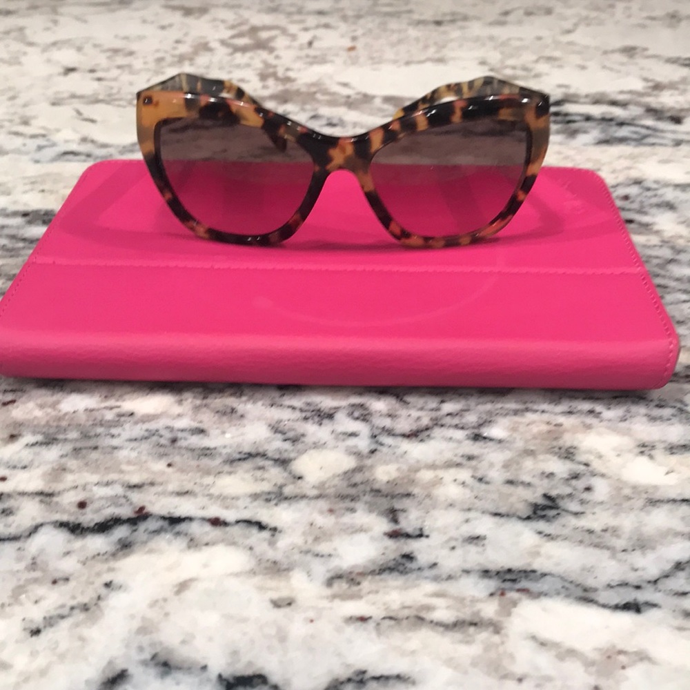 Ladies Prada Sunglasses.